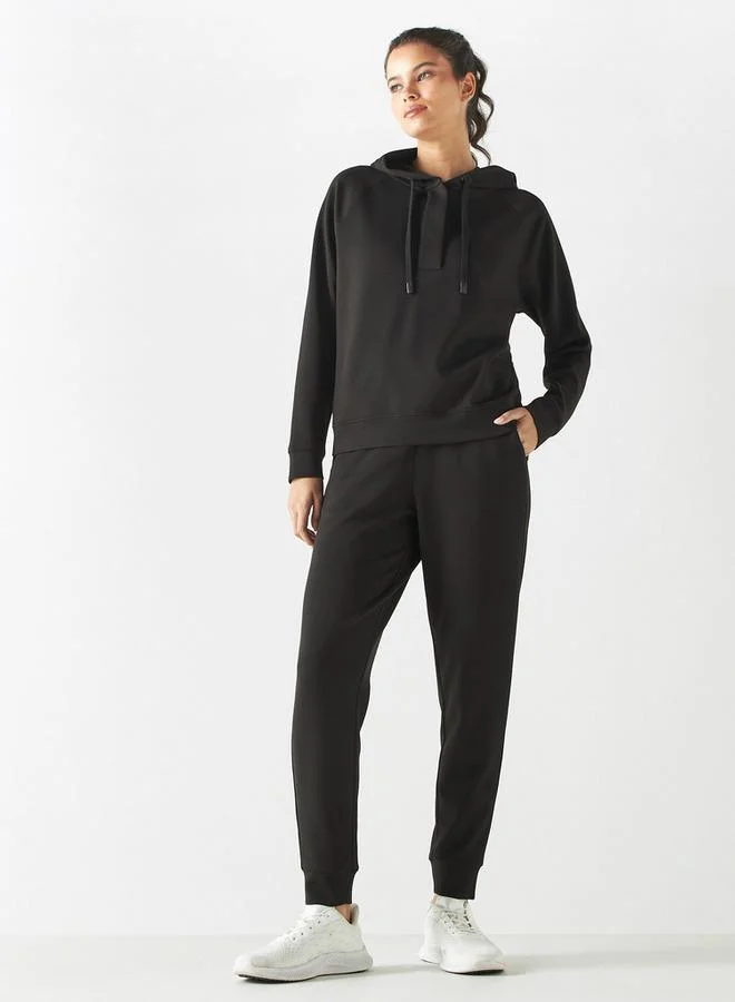 ادوت من سبلاش بنطلون رياضي سادة برباط وجيوب