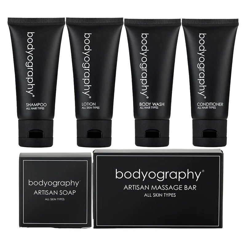 world amenities Bodyography Toiletry Kit 6 Piece Set Shampoo Conditioner Body Wash Lotion Hand Soap Massage Bar Clear Travel Bag - Image 1
