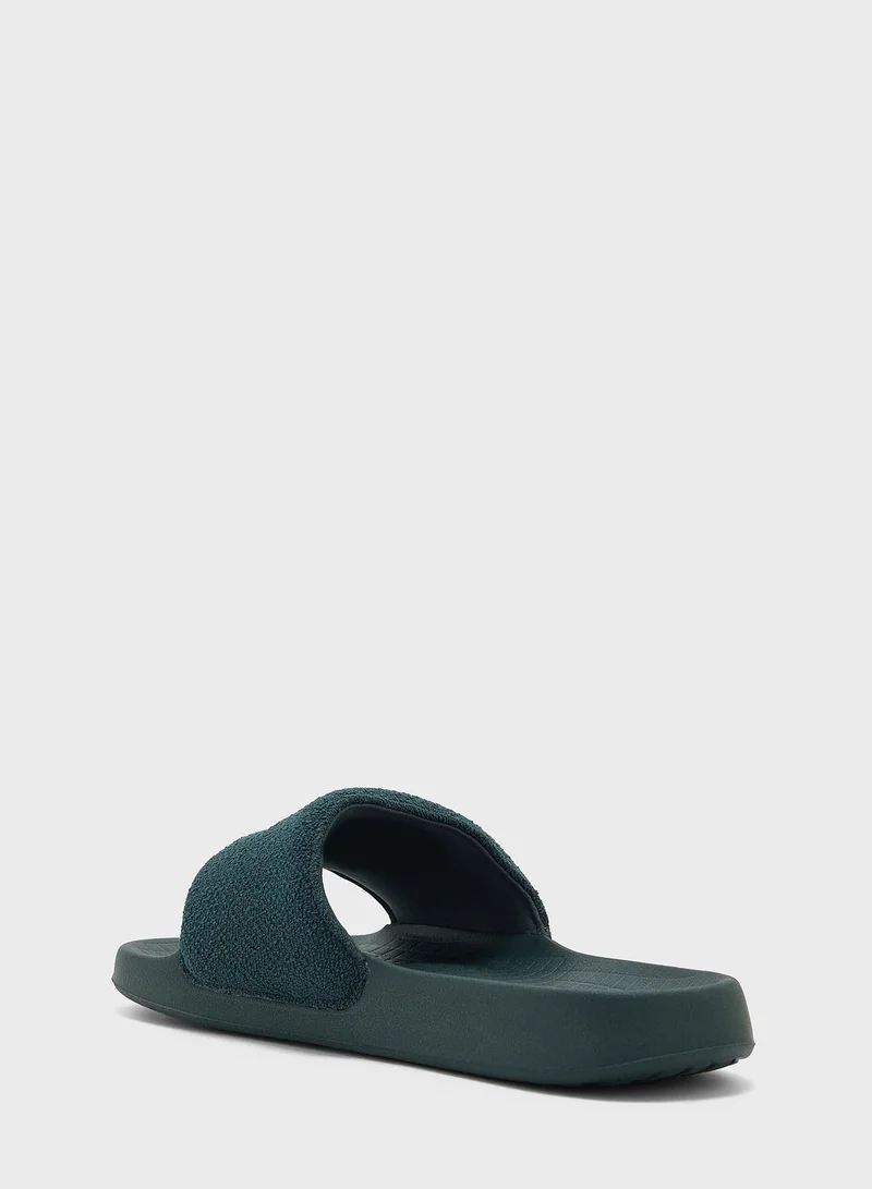LACOSTE Serve Logo Slides
