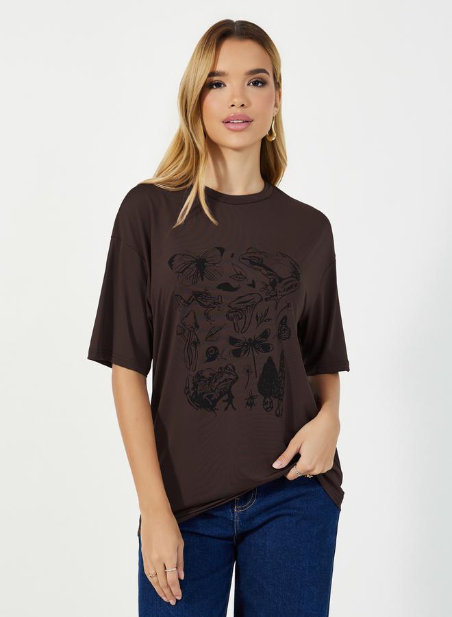 Styli Oversized Graphic Print Round Neck T-shirt - Image 1