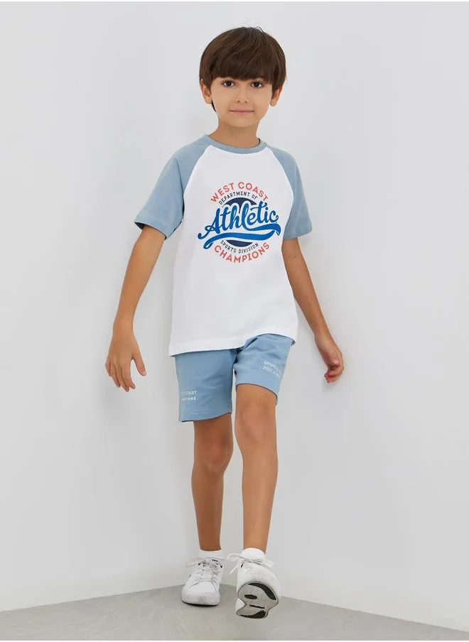 Styli Styli Slogan Print Reglan Sleeve T-Shirt and Shorts Set
