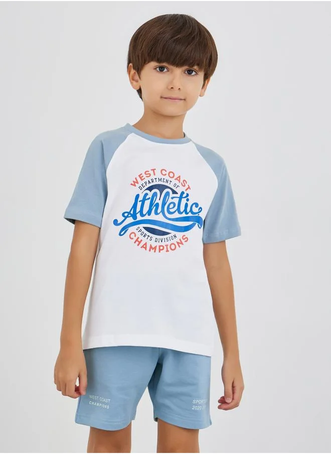 Styli Styli Slogan Print Reglan Sleeve T-Shirt and Shorts Set