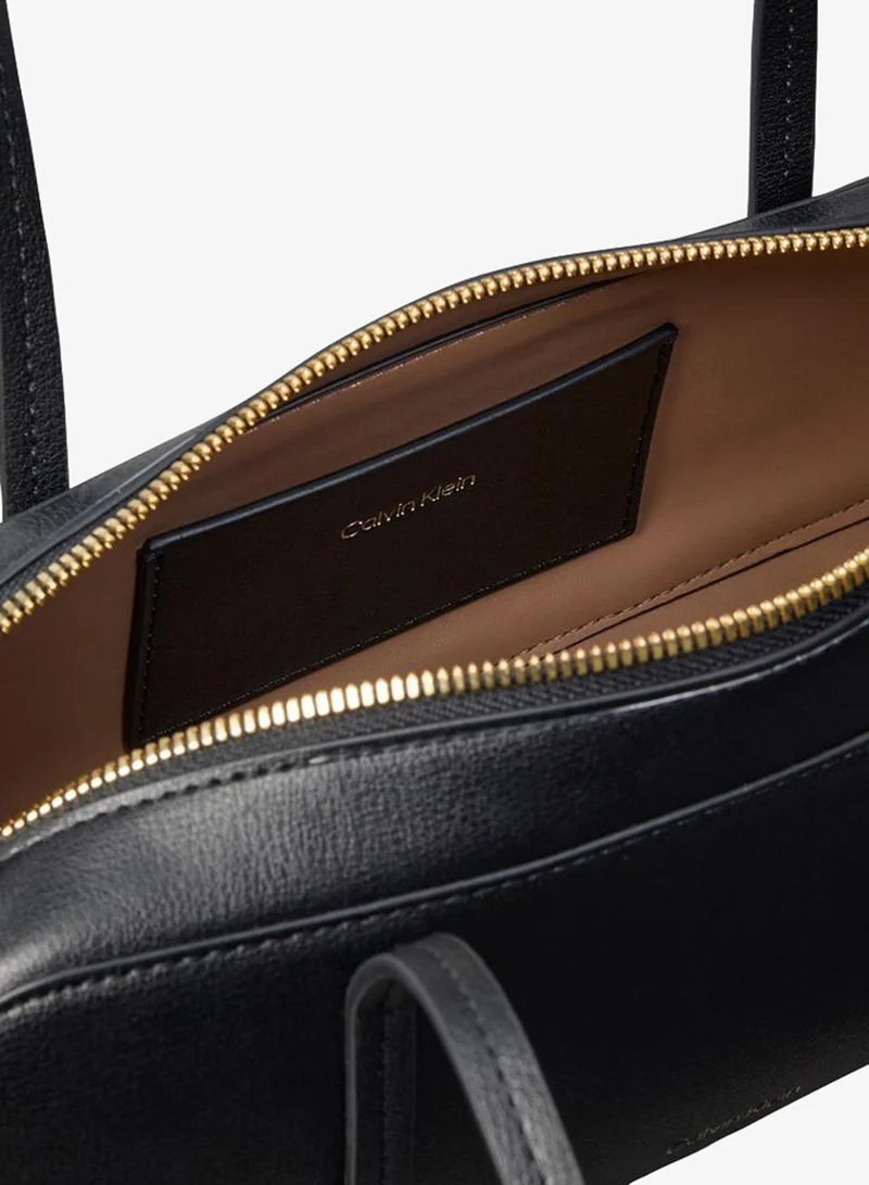 Calvin Klein  Metallic Logo Textured Barrel Bag for Women | Best Price UAE