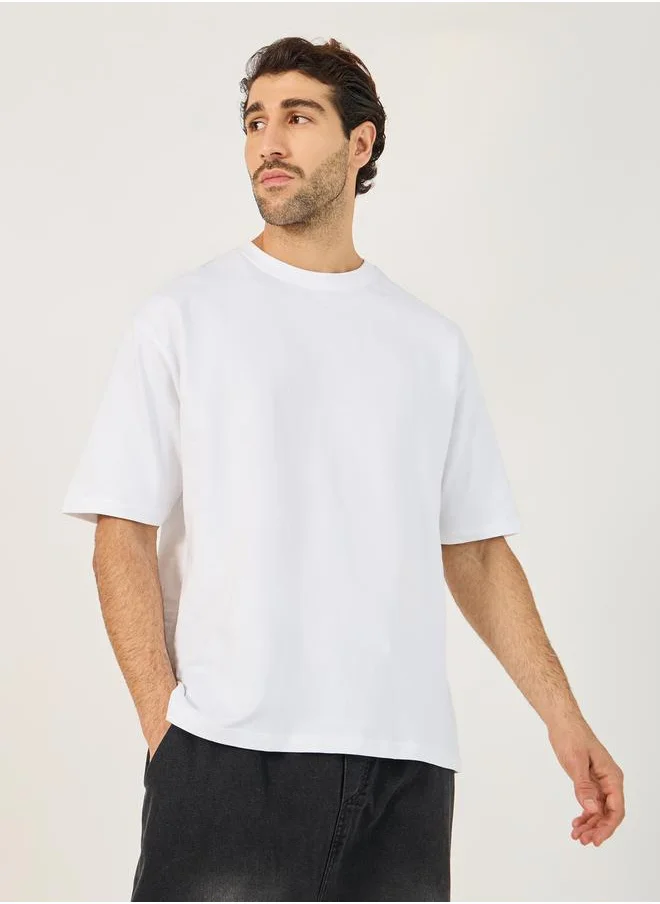 ستايلي Back Graphic Print Dropped Shoulder Oversized T-Shirt