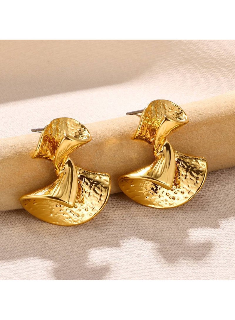 "Twister Gold Earrings, an elegant design that adds a touch of luxury to your look."