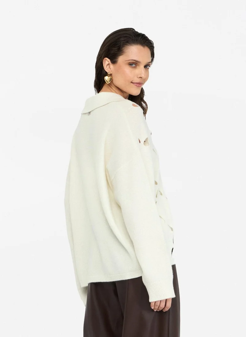 ليو جو كنزة صوف مطرزة بالجواهر