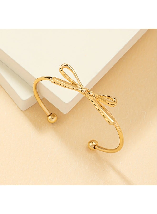 Goolsky A Vintage-Style Open Bangle with a Simple Bow Decoration, Embodying a European And American Aesthetic. - Image 1