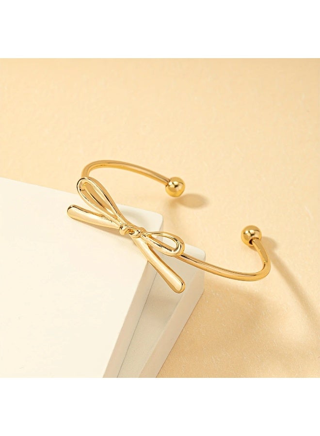 Goolsky A Vintage-Style Open Bangle with a Simple Bow Decoration, Embodying a European And American Aesthetic. - Image 4