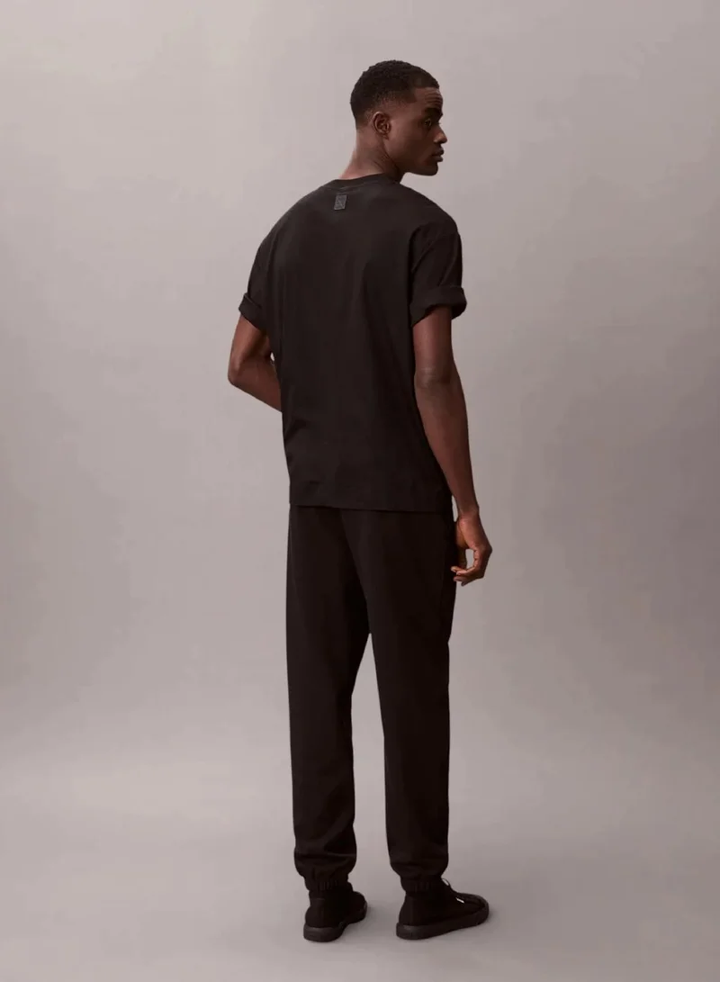 Calvin Klein Black 1968 Graphic Terry Cuffed Joggers for Men | Best Price UAE