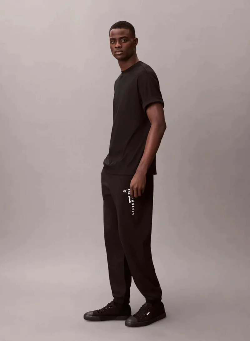 Calvin Klein Black 1968 Graphic Terry Cuffed Joggers for Men | Best Price UAE