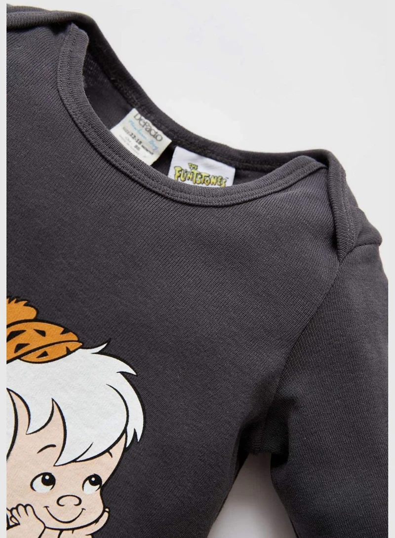 ديفاكتو Flinstones Licenced Long Sleeve Newborn Sleepsuit