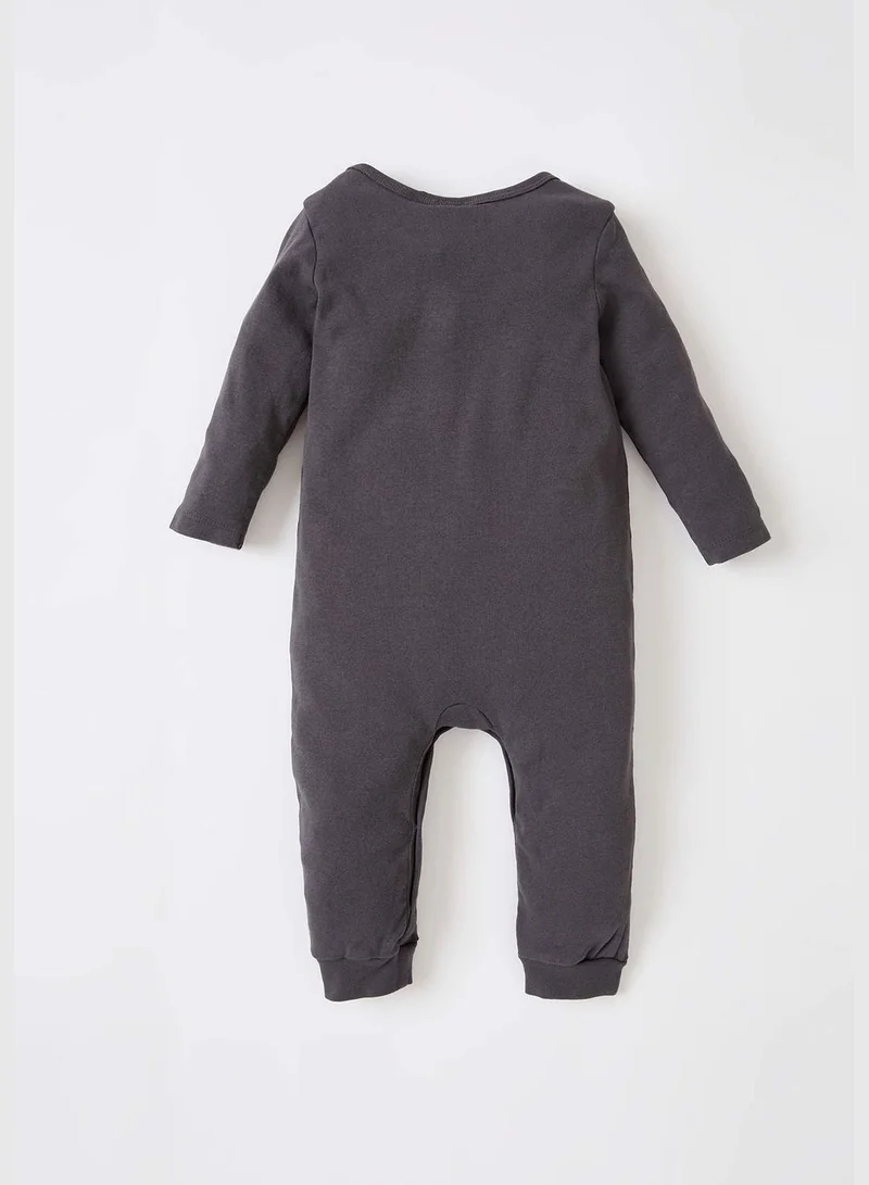 ديفاكتو Flinstones Licenced Long Sleeve Newborn Sleepsuit