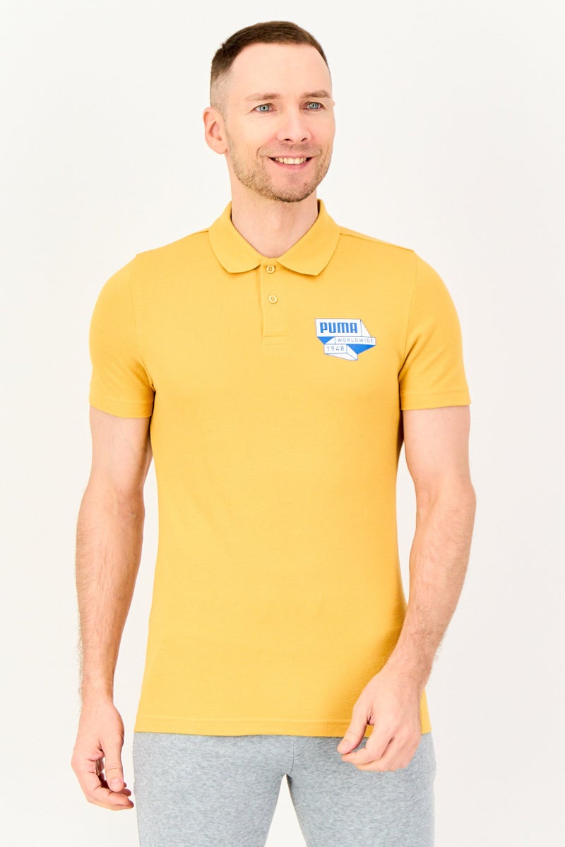PUMA Men Slim Fit Short Sleeve Outdoor Polo Shirt, Mustard Yellow - Image 1