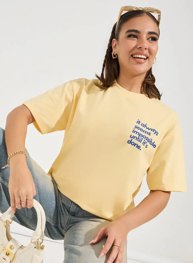 Styli Oversized Slogan Print T-Shirt with Dropped Shoulder