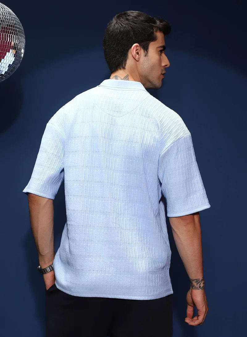 Campus Sutra Men's Powder Blue Bubble Cuban Polo T-Shirt For Casual Wear | Polo Neck | Short Cuffed Sleeves | Half-Button Closure | T-Shirt Shirt Crafted With Comfort Fit For Everyday Wear
