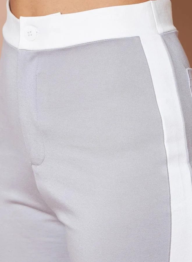 ساسافراس High Rise Contrast Side Panel Flared Pants by Styli