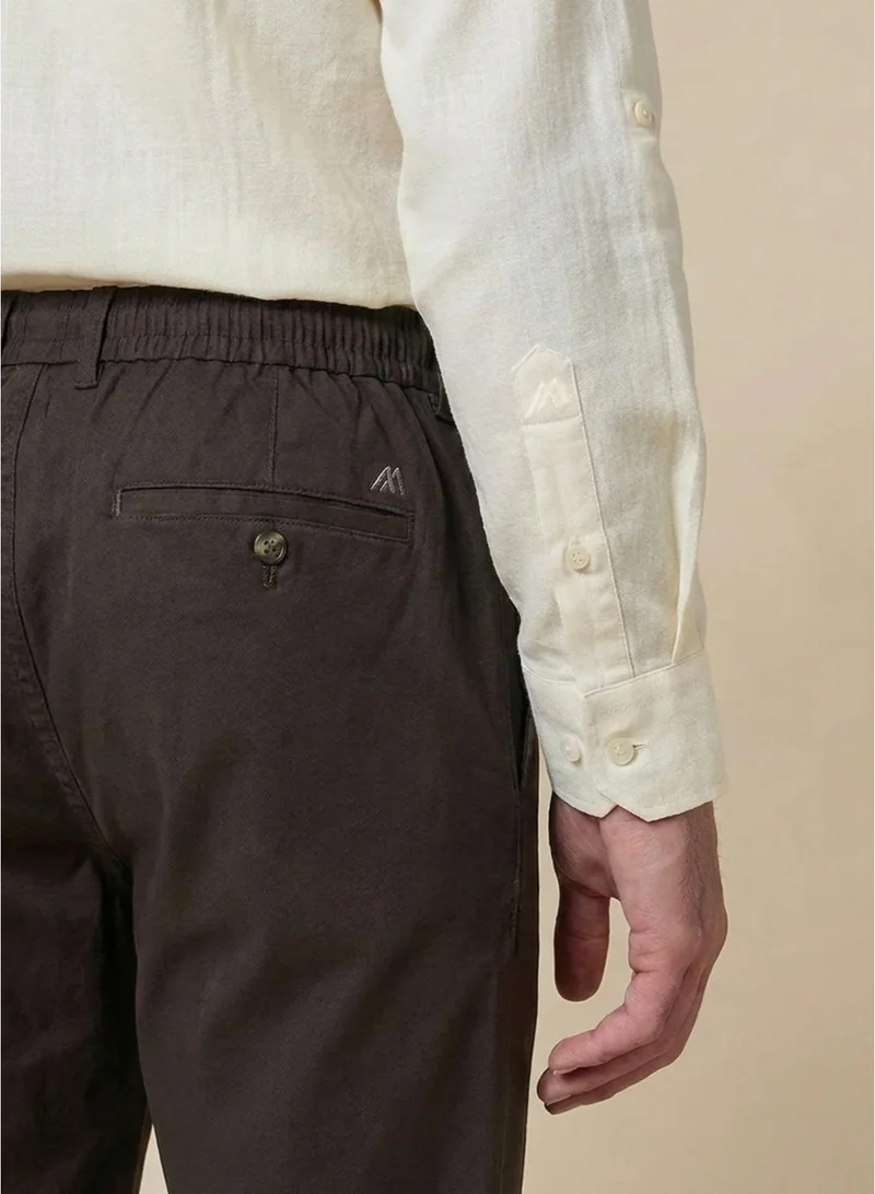 MANNERISM  The Terraform Brown Linen Blend Trousers  Comfort Fit for Men | Best Price UAE
