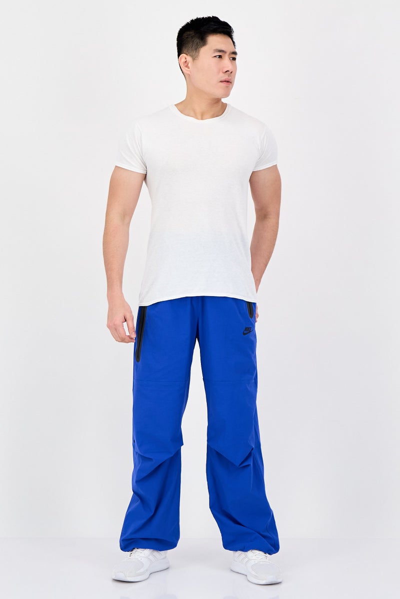 Nike Men Oversized Fit Brand Logo Training Track Pants, Royal Blue - Image 4