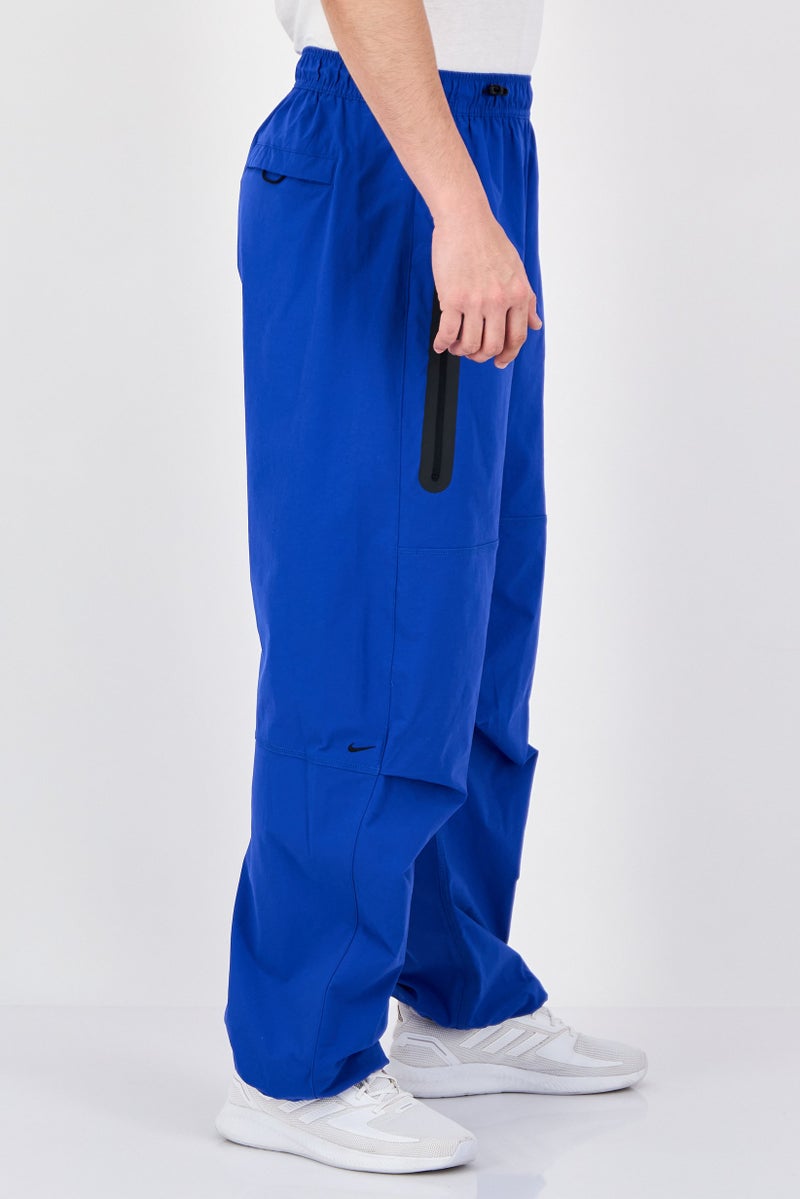 Nike Men Oversized Fit Brand Logo Training Track Pants, Royal Blue - Image 1