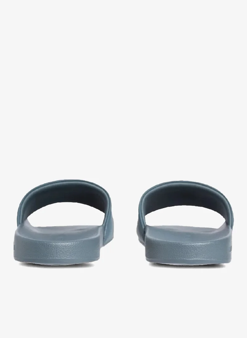 Calvin Klein Jeans Seaside Aqua/White Logo Sliders for Men | Best Price UAE