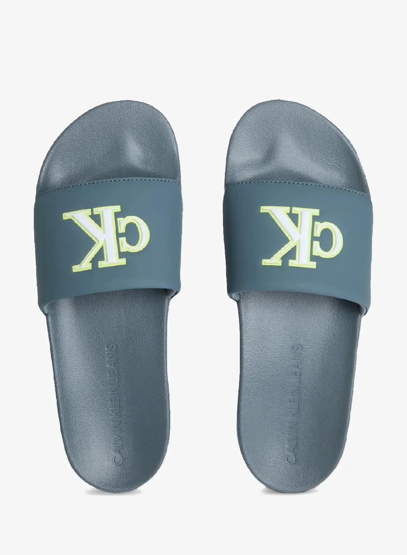Calvin Klein Jeans Seaside Aqua/White Logo Sliders for Men | Best Price UAE