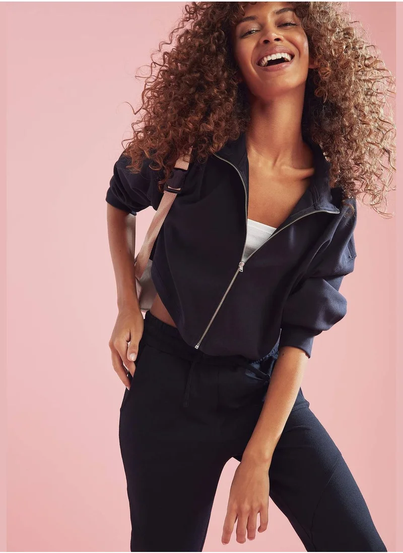 ديفاكتو Turtleneck Zippered Crop Cardigan