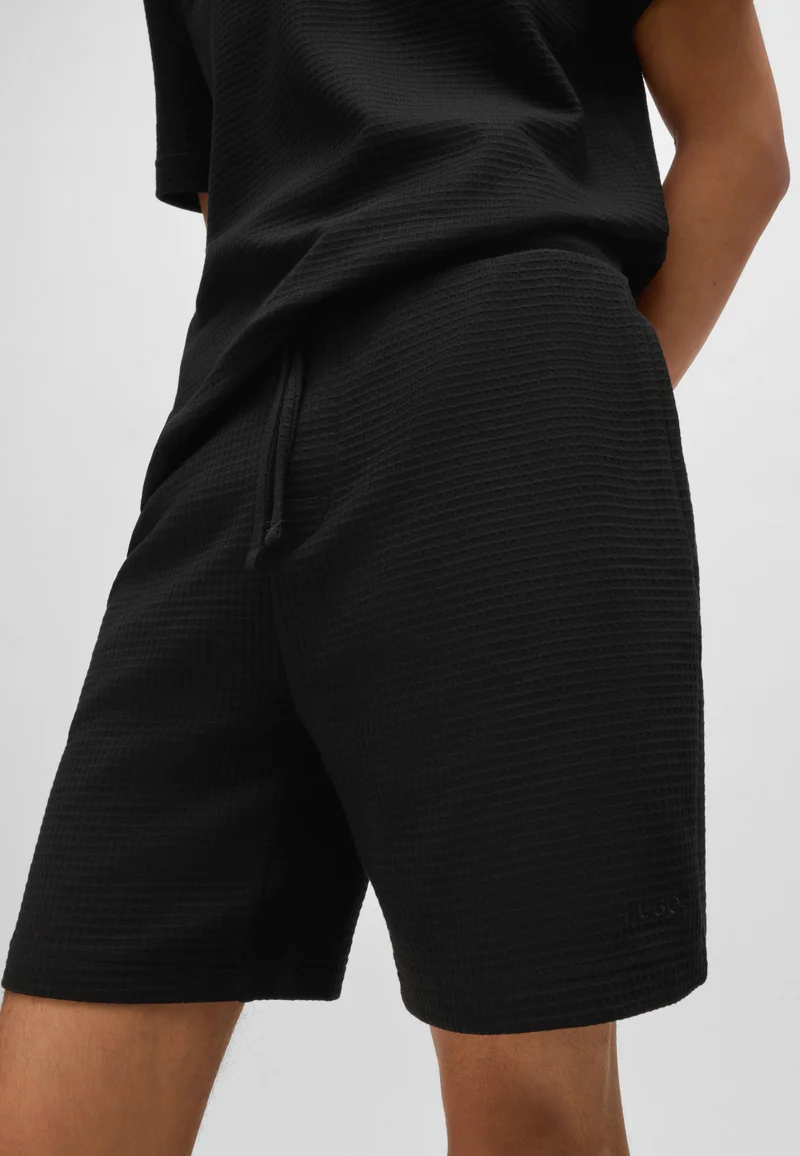 HUGO Waffle-structured pyjama shorts with embroidered logo