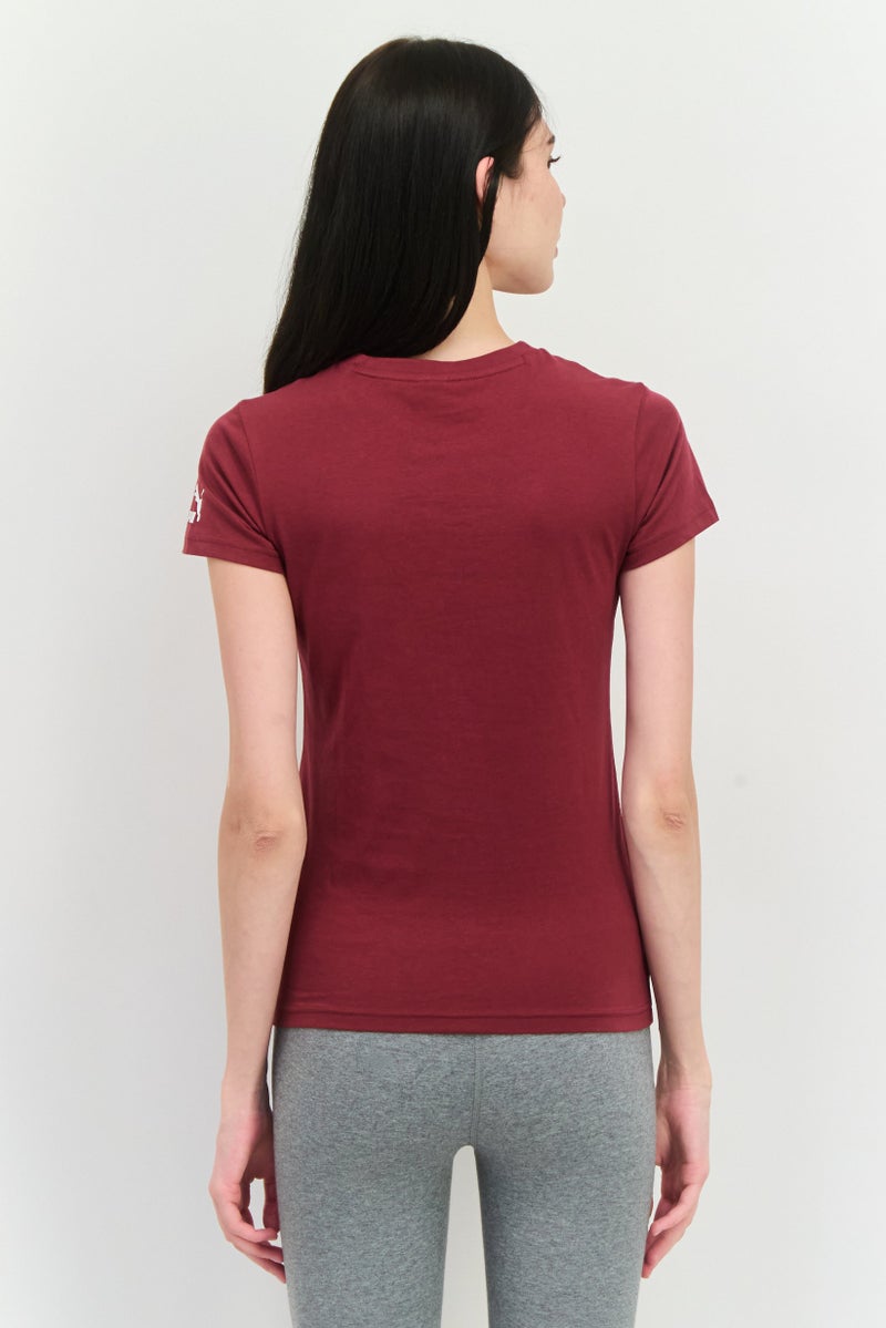 PUMA ملابس رياضية نسائية بتصميم زهور بأكمام قصيرة، مارون - Image 2