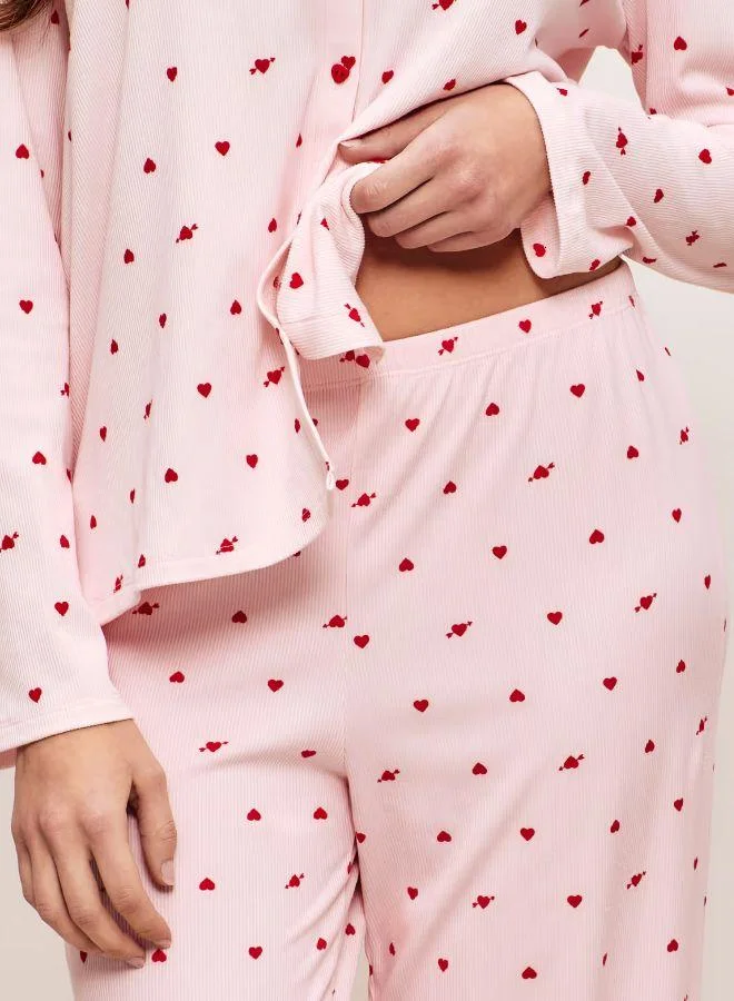 UNDIZ Ribbed jersey trousers with heart pattern