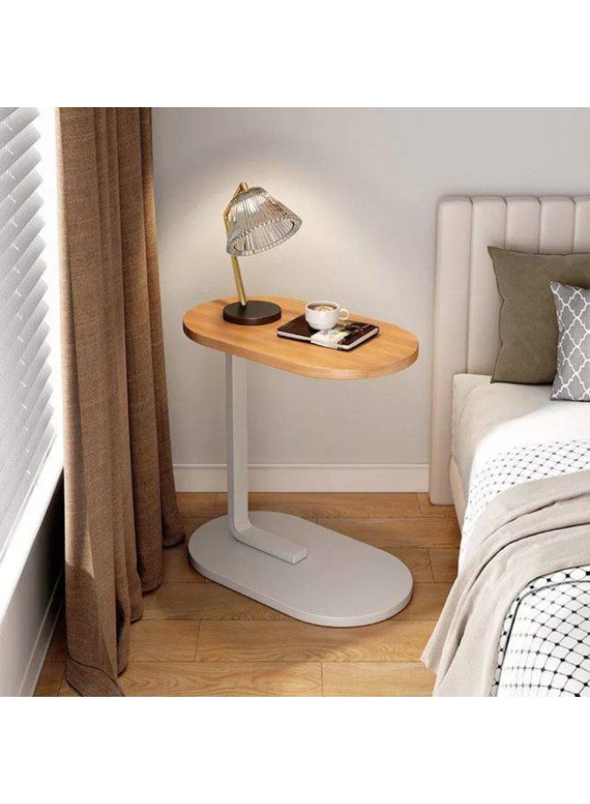 ترابيزة جانبية مودرن بشكل حرف C سطح بيضاوي أنيق + رجل معدن قوية = شياكة وعملية في مكان واحد! تنزلق تحت الكنب أو السرير بسهولةمثالية للقهوة، اللابتوب أو كتابك المفضل تصميم عصري يضيف لمسة ديكور لأي ركن - Image 2