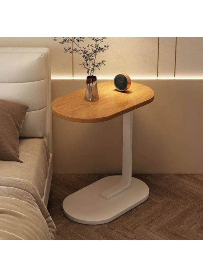 ترابيزة جانبية مودرن بشكل حرف C سطح بيضاوي أنيق + رجل معدن قوية = شياكة وعملية في مكان واحد! تنزلق تحت الكنب أو السرير بسهولةمثالية للقهوة، اللابتوب أو كتابك المفضل تصميم عصري يضيف لمسة ديكور لأي ركن - Image 1