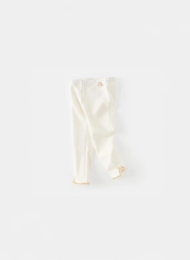 Dave & Bella Off White Leggings