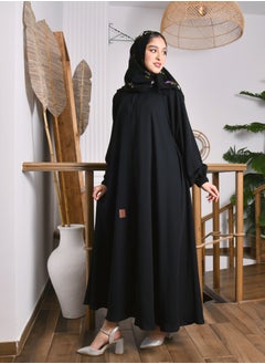 A closed abaya with a cloche cut and a slit at the back with a button and cuffed sleeves