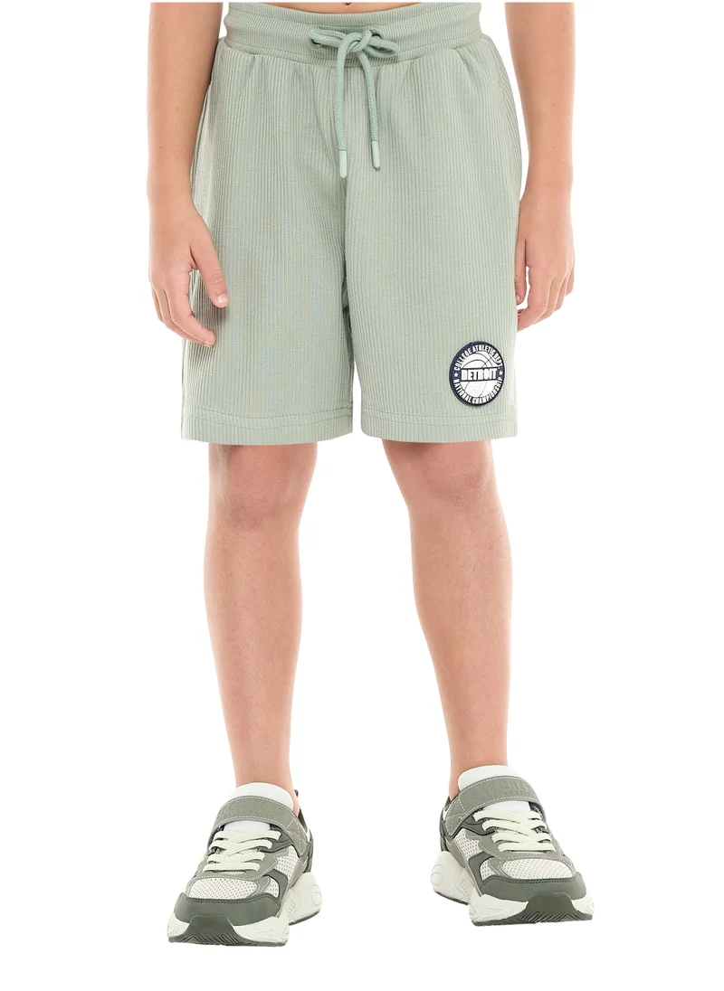 victor and jane Oversized - Boys' Jacquard 2-Piece Set - T-Shirt with Badge Detail and matching Shorts with Pockets