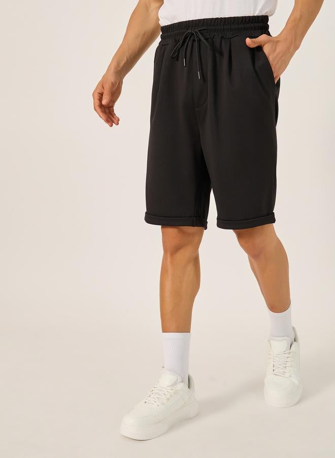 ستايلي شورت سادة بخصر مطوي - Image 1