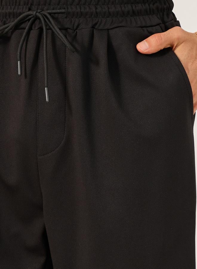 ستايلي شورت سادة بخصر مطوي - Image 3