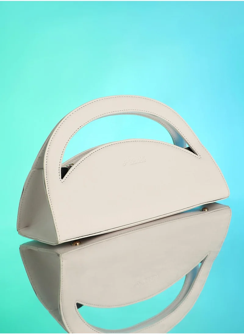 صوص هاوت Haute Sauce Women's The Mezzaluna Hand Bag For Casual Wear | Ivory White Colour | One-Size| Zipper Closure | Vegan Leather Material | Non-Detachable Handle | Bags For Woman & Girls