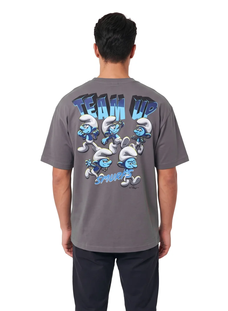 The Smurfs The Smurfs Team Up Men’s Oversized T-Shirt | Back Print Graphic Casual Crew Neck Cotton Tee