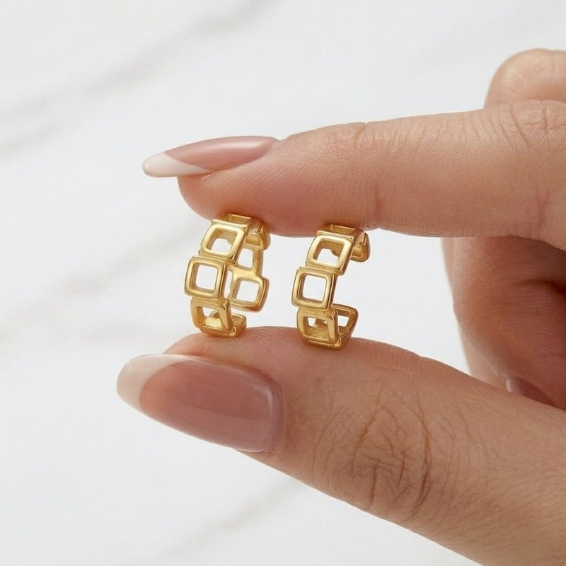 A distinctive, elegant gold earring with a hollow geometric design, made up of connected squares, giving you a unique modern touch. It does not require ear piercing for easy wear and all-day comfort. - Image 4