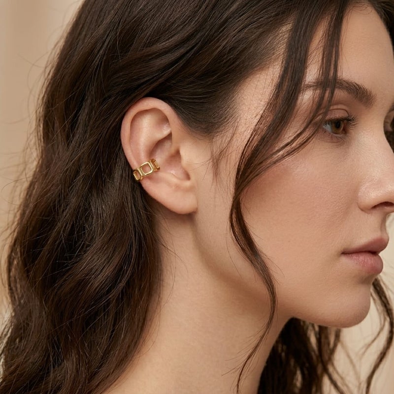 A distinctive, elegant gold earring with a hollow geometric design, made up of connected squares, giving you a unique modern touch. It does not require ear piercing for easy wear and all-day comfort. - Image 3