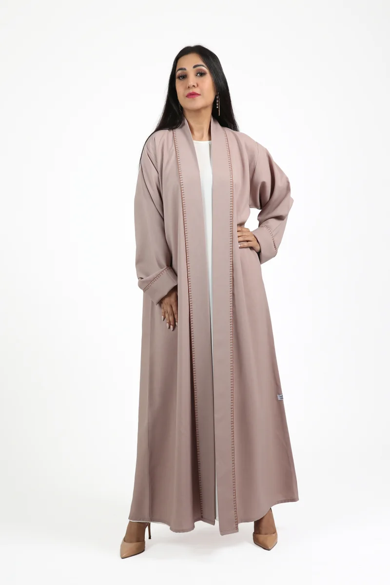 Nikias  Nikias Overlap barbie fabric  abaya with white pipping on sleves and front for Women | Best Price UAE