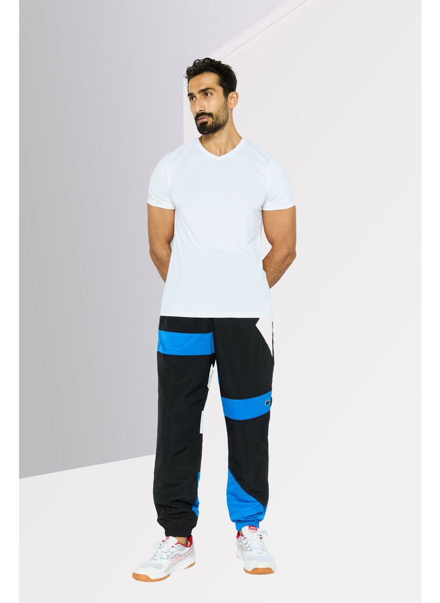 LACOSTE - Men Regular Fit Brand Logo Jogger Pants, Black Combo - Image 1