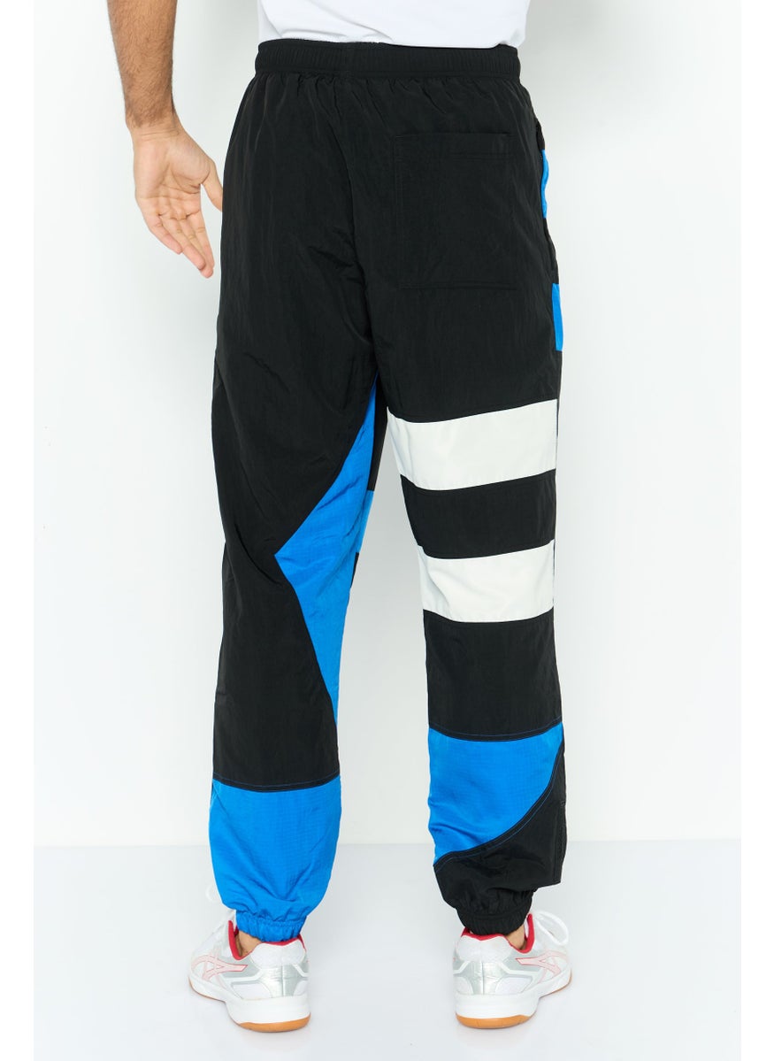 LACOSTE - Men Regular Fit Brand Logo Jogger Pants, Black Combo - Image 1