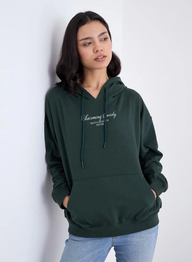 Styli Dark Green Slogan Print Oversized Hoodie