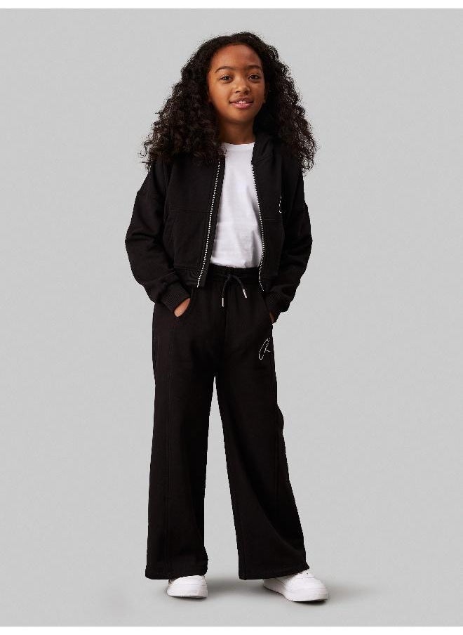Calvin Klein Jeans - سروال سويت بانت للأطفال واسع الساقين - Image 1