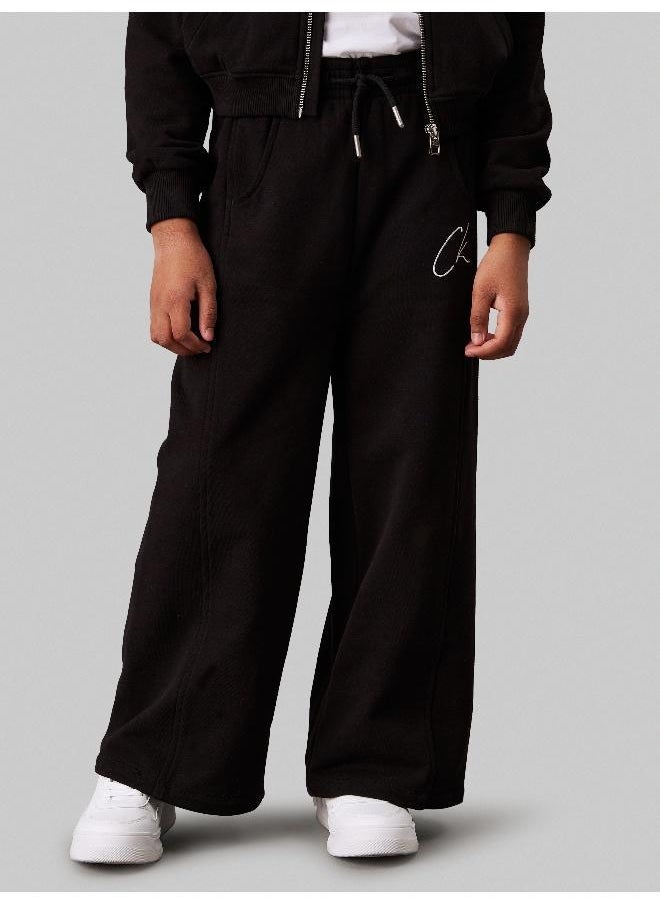 Calvin Klein Jeans - سروال سويت بانت للأطفال واسع الساقين - Image 1