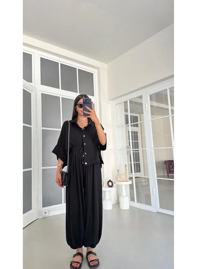 Gaus  Black Bat‑sleeve Snap‑Button Jacket with Elastic‑waist Palazzo Pants, Two‑piece Modal Set GAUS-01835. for Women | Best Price UAE