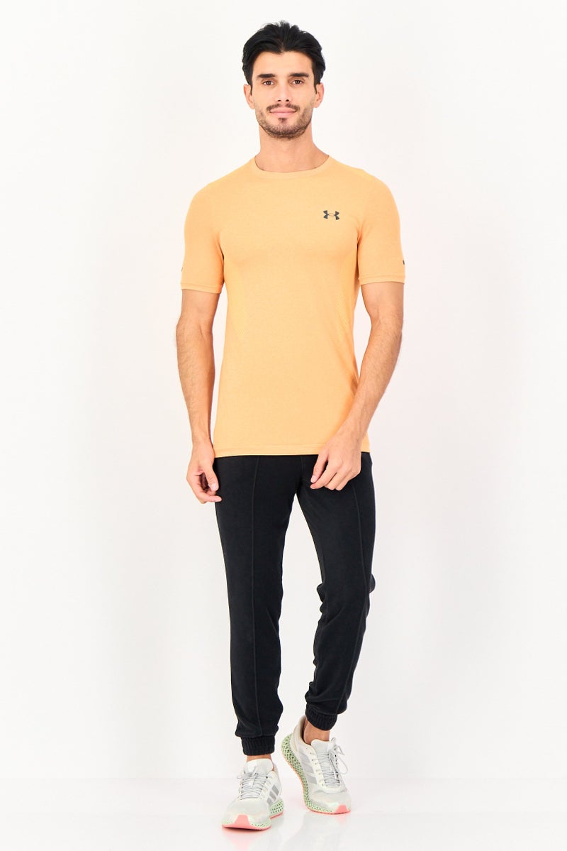 UNDER ARMOUR تي شيرت تدريب قصير الأكمام للرجال بتصميم مريح، برتقالي - Image 4