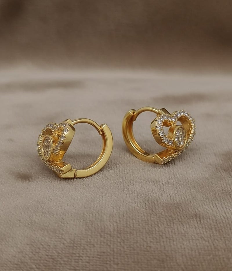 A delicate gold-plated hoop featuring a twisted heart design studded with dazzling white zircon stones. A shiny circular shape in the center adds an elegant touch. - Image 4