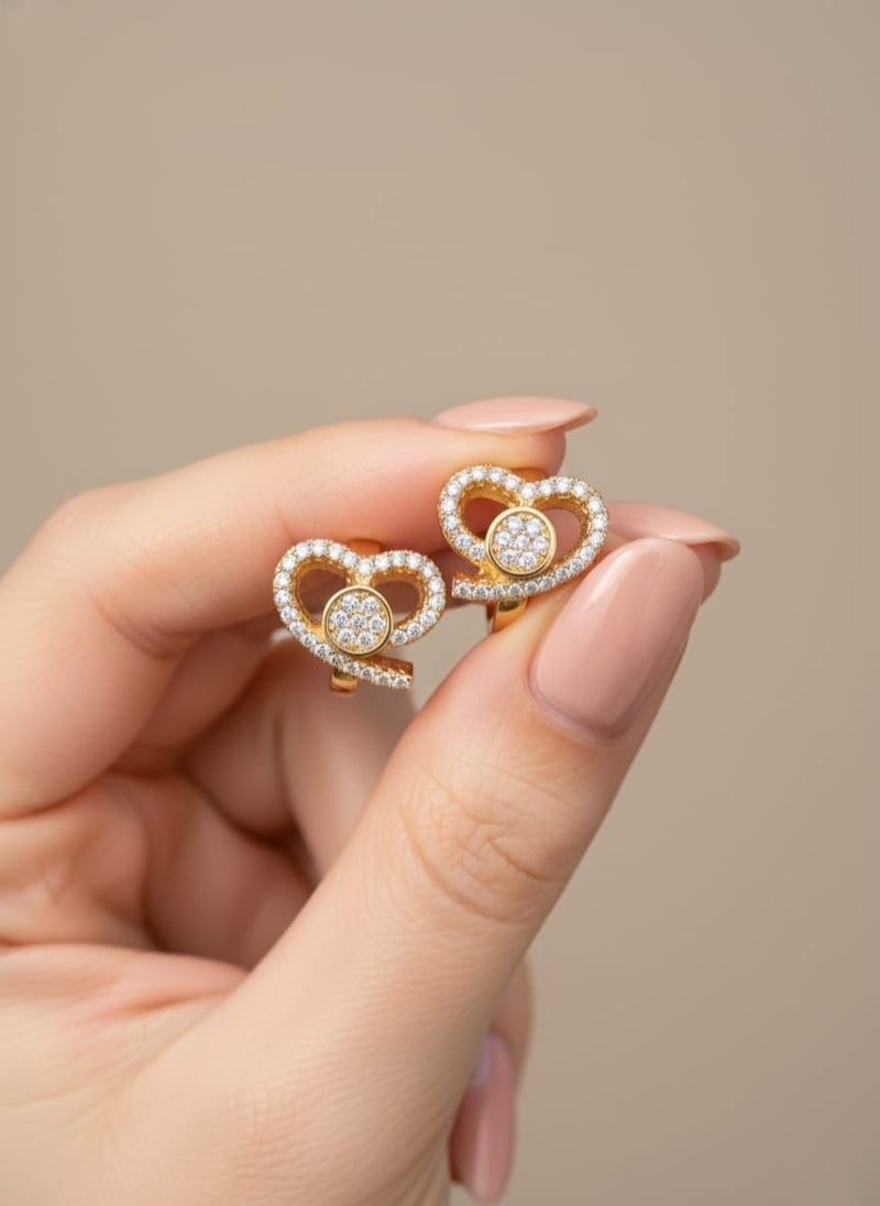 A delicate gold-plated hoop featuring a twisted heart design studded with dazzling white zircon stones. A shiny circular shape in the center adds an elegant touch. - Image 3